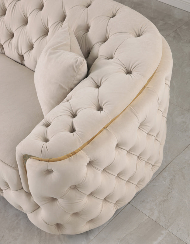 Crown Lounge with beige velvet and lasting comfort, enhancing a modern living area.