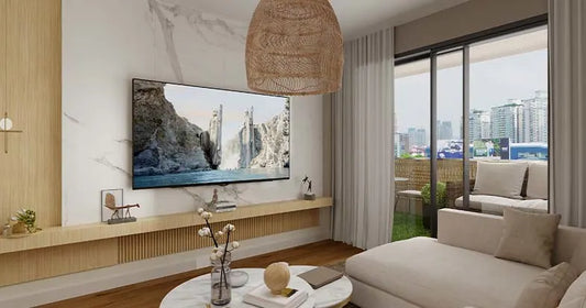 Sleek minimalist TV entertainment unit styled with home decor in a modern living space.