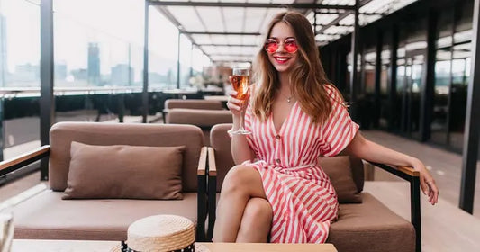 woman relaxing on a modern lounge sofa representing Easter furniture sale deals in Australia