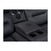 Black Excaliber 2-Seater Lounge with electric recliners and LED lighting, in a trendy lounge setting.