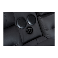 Excaliber 2-Seater Lounge with cooling cup holder and Bluetooth console, set in a luxurious interior.