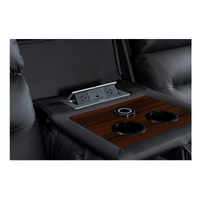 Black Excaliber 3-Seater Lounge with dual motors and reading lights, in a contemporary living space.