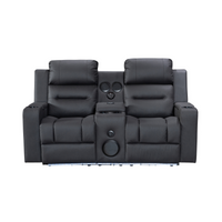Black Excaliber 2-Seater Lounge with dual electric recliners and LED cup holder, set in a modern living room.
