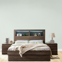 Fiji Mocha Bed Suite featuring roll-out drawers, foot-end storage, bookcase headboard with night light, and tallboy with hidden compartment.