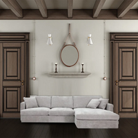 Licorice Brody Fab 2.5 Seater with RHF Chaise, featuring sleek arms and polyester fabric, in a stylish space.