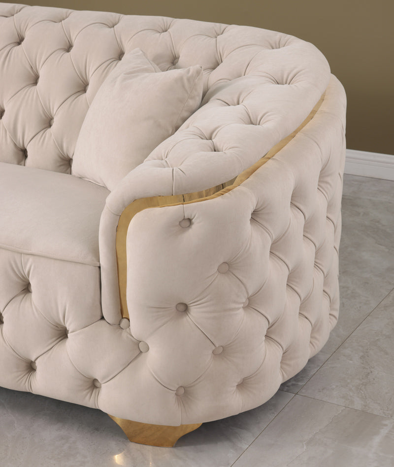 Plush velvet lounge with polyester filling and S springs, displayed in a modern lounge space.