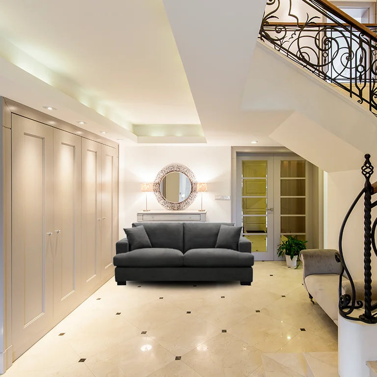 Dark Grey Hasting Fab 2.5 Seater with low-profile design and polyester fabric, set in a stylish space.