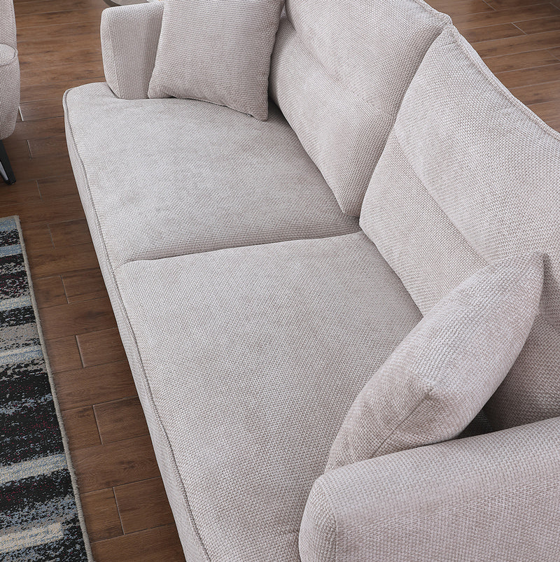 Beige Lydia Lounge with sophisticated charm, set in a contemporary lounge space.