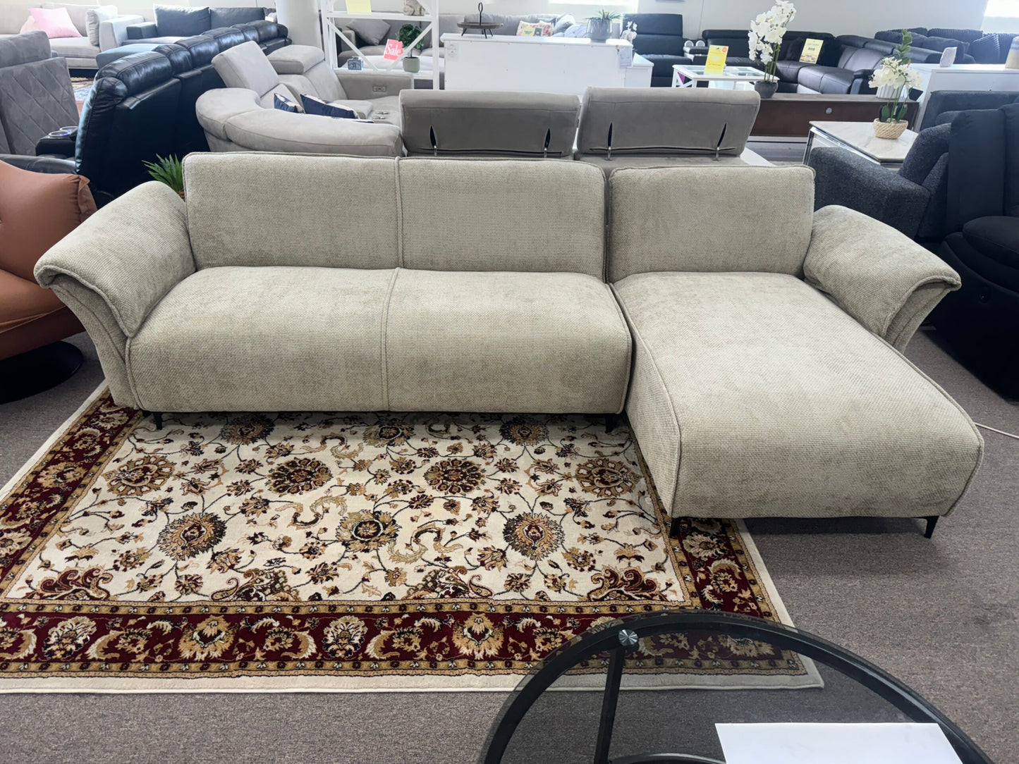 Beige polyester Nile Reversal Sofabed, blending practicality and elegance, in a cozy interior.