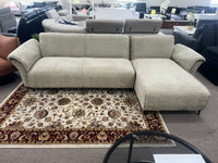 Beige polyester Nile Reversal Sofabed, blending practicality and elegance, in a cozy interior.