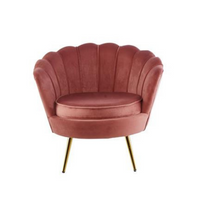 Serena Armchair with plush velvet and gold metal legs, set in a luxurious living room.