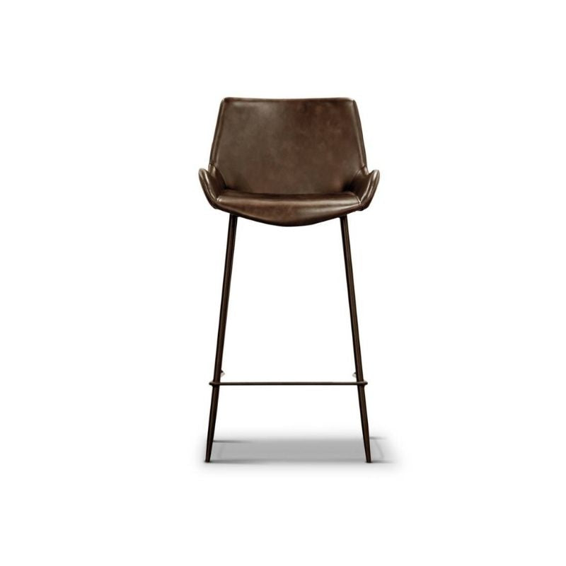 Versatile bar chair with PU leather and metal legs, displayed in a stylish dining area.