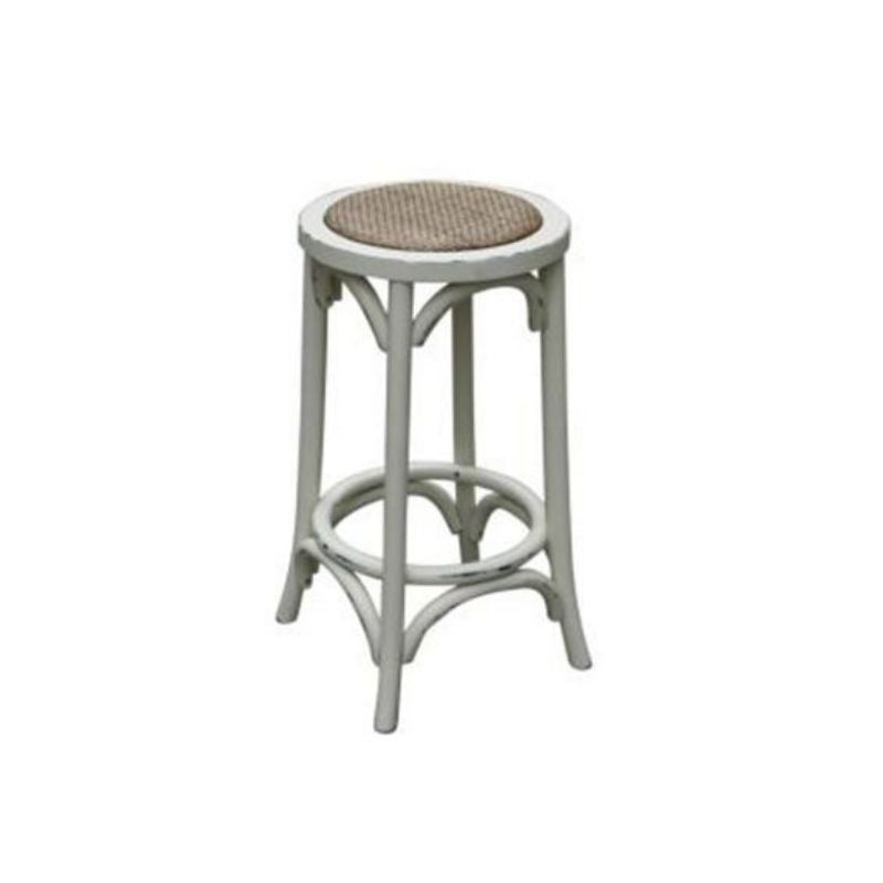 Versatile Baker Stool with oak and metal design, displayed in a stylish living room.