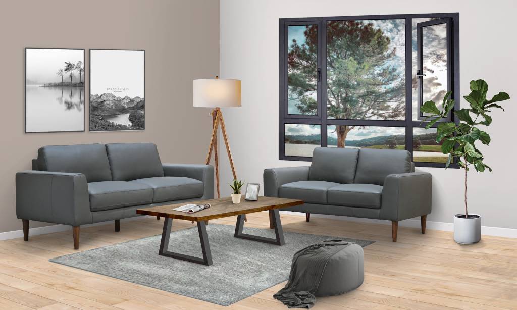 Contemporary 3 and 2 seater lounge set featuring premium leather, fixed cushions, and mid oak timber legs for stylish, versatile living spaces.