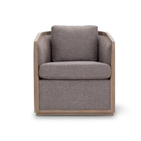 Stylish swivel chair with pine frame, deep foam seating, polyester upholstery, scatter cushions, and ottoman.