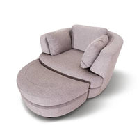 Stylish swivel chaise lounge chair with ottoman, featuring deep seating, scatter cushions, and a 360-degree swivel for modern living.