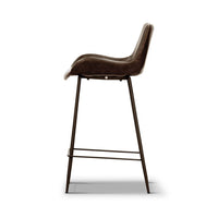 Dover Bar Chair with backrest and durable materials, enhancing a contemporary living space.