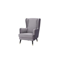 Cooper Arm Chair with polyester upholstery and stable timber legs, displayed in a modern lounge.