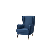 Cooper Arm Chair with durable frame and comfortable foam, set in a chic living area.