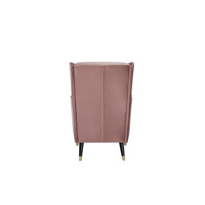 Cooper Arm Chair with soft-touch fabric and sturdy springs, enhancing a stylish living space.