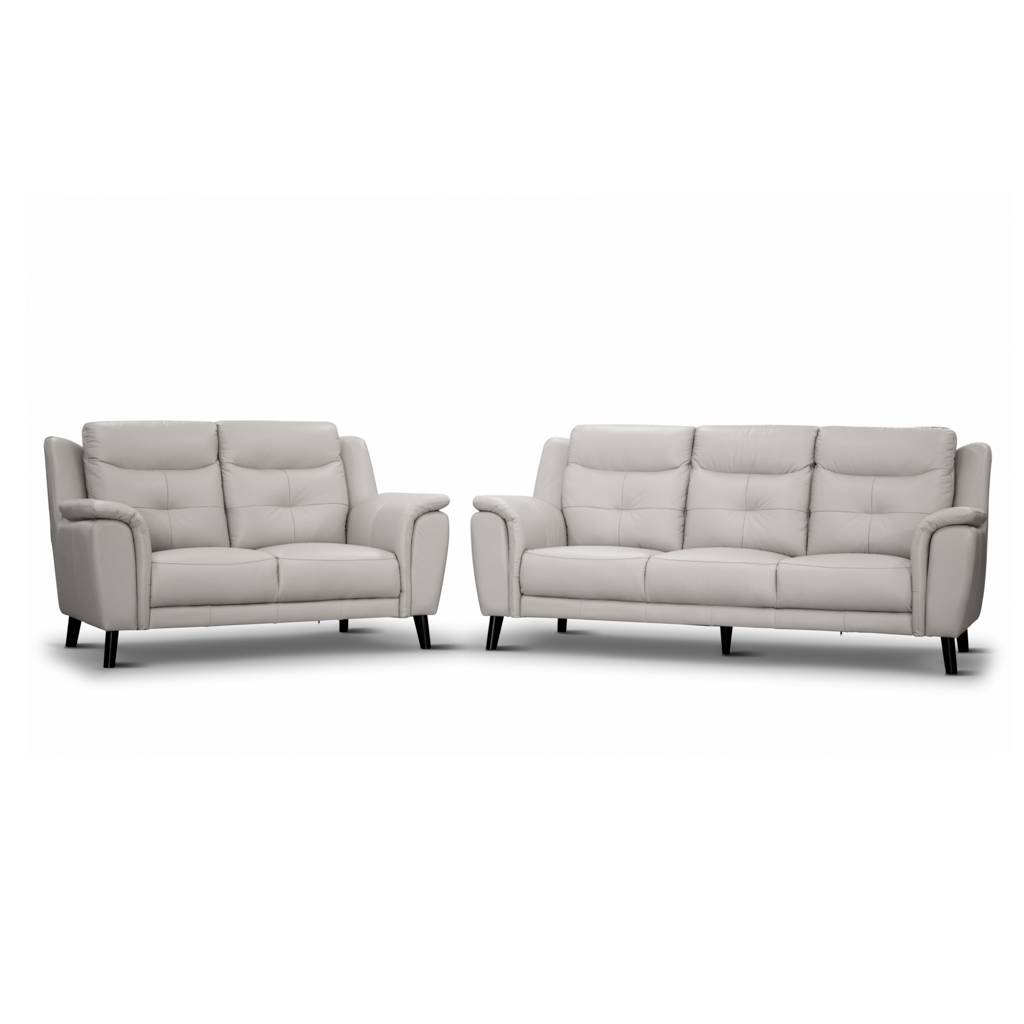 Silver or Gunmetal 3+2 lounge with side pillow arms, channelled high-back cushions, and 100% leather upholstery for modern luxury.
