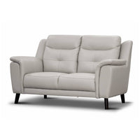 Sophisticated 2 seater lounge with side pillow arms, channelled high-back cushions, and leather upholstery for a timeless, stylish look.