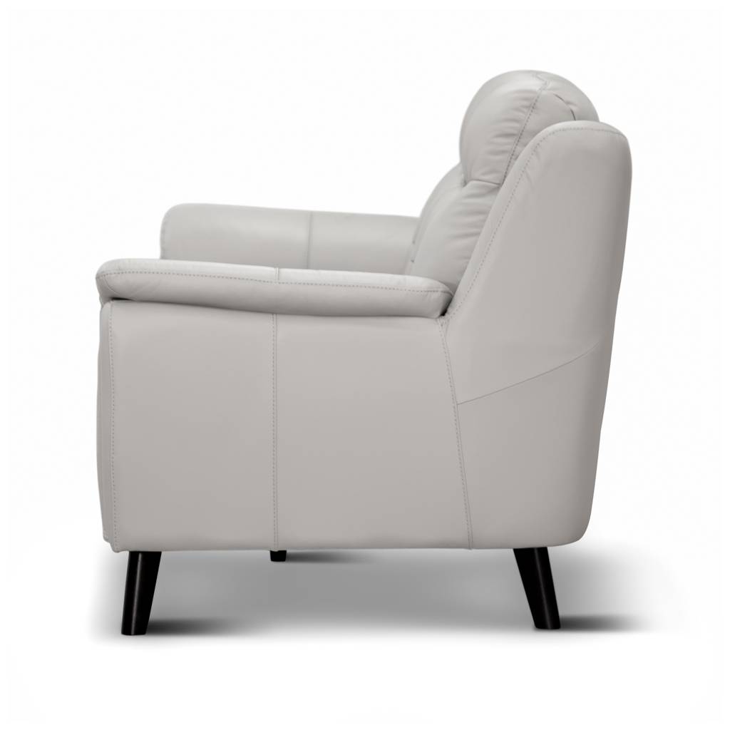 Modern 3 seater lounge with side pillow arms, channelled seat cushions, and premium leather upholstery, available in Silver or Gunmetal.