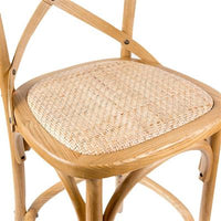 Birch timber bar stool with rattan seat and classic design, set in a cozy kitchen.