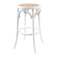 Birch timber stool with rattan seat and curved design, set in a cozy kitchen.