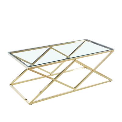Stainless steel coffee table with clear tempered glass top, set in a modern living room.