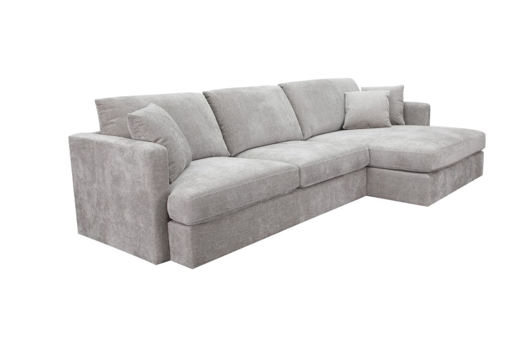 Licorice Brody Fab 2.5 Seater with RHF Chaise, upholstered in polyester with sleek arms, in a chic interior.