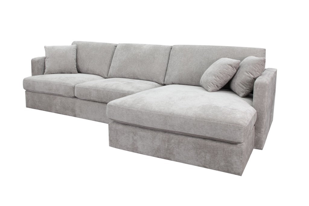 Slate Brody Fab 2.5 Seater with RHF Chaise, featuring foam cushions and a sturdy frame, in a bright space.
