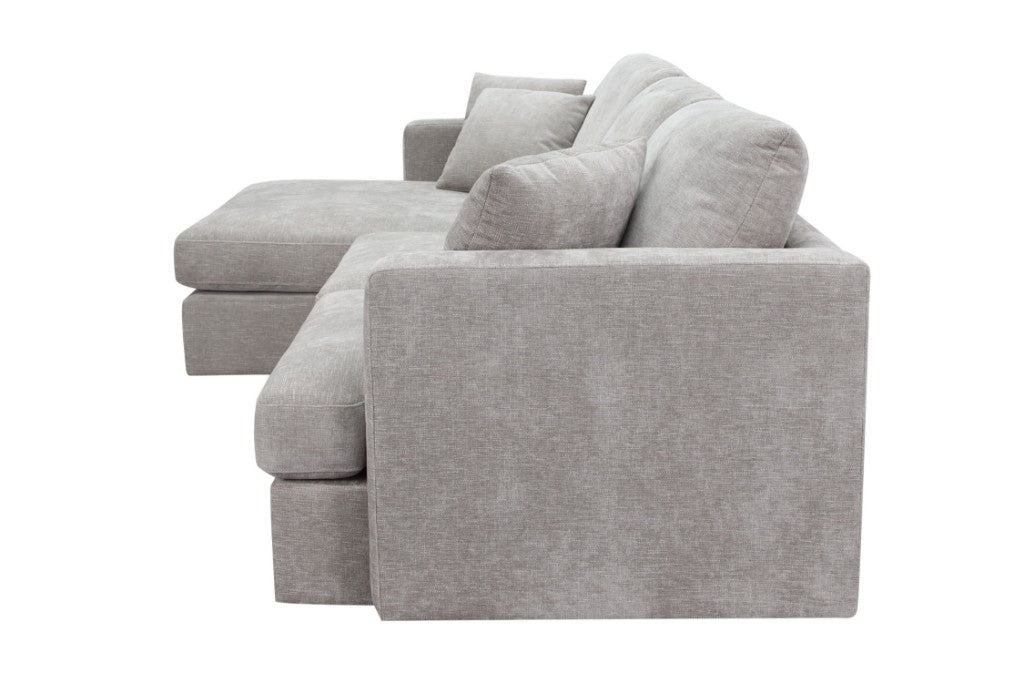 Slate Brody Fab 2.5 Seater with LHF Chaise and three scatter cushions, enhancing a contemporary living area.
