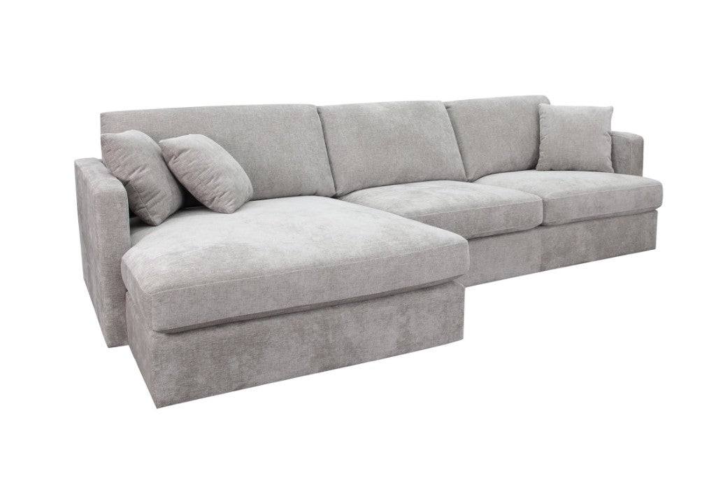 Licorice Brody Fab 2.5 Seater with LHF Chaise, upholstered in polyester with sleek arms, in a chic interior.