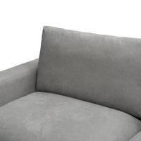 Light Grey Hasting Fab 2.5 Seater with low-profile look and S-spring support, in a trendy living area.