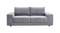 Fog Kingston Sofa with low-profile design and square arms, set in a modern living room.