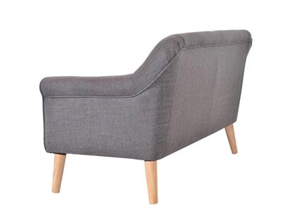 Muted Orange Lavender 2.5 Seater featuring a single cushion and piping, positioned in a vibrant living room.