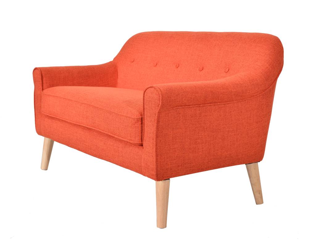 Blue Lavender 2.5 Seater with slanted arms and generous cushioning, supported by oak-colored legs in a bright room.