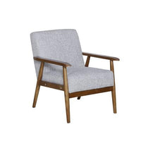 Comfortable armchair with plywood frame, polyester upholstery, webbing, foam, springs, and sturdy rubberwood legs.