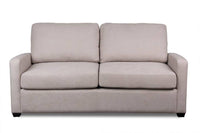 Loft Graphite Zoe Double Sofa Bed with loose cushions and memory foam, in a trendy living area.